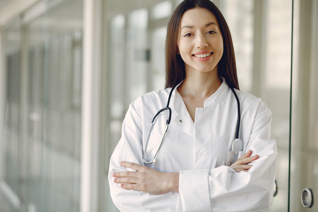 Smiling doctor in a clinic